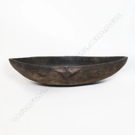An old PNG Siassi carved wood bowl,